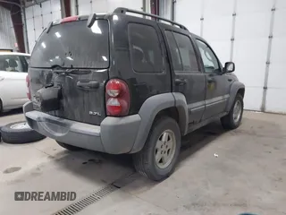 2005 Jeep Liberty Sport with VIN 1J4GL48K55W711355, listed as a IAAI auction lot 41743670 with 226,160 mi miles and . Bid and sale history available at carsss.com. Image 4.
