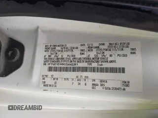 2012 Ford Econoline Cargo Commercial with VIN 1FTNE1EW6CDA42261, listed as a IAAI auction lot 41750879 with 249,408 mi miles and . Bid and sale history available at carsss.com. Image 9.