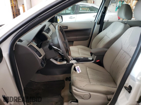 2009 Ford Focus SE with VIN 1FAHP35N19W146251, listed as a Copart auction lot 68979994 with 58,315 mi miles and Salvage Title. Bid and sale history available at carsss.com. Image 7.