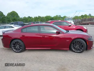 2020 Dodge Charger Scat Pack z VIN 2C3CDXGJ9LH112566, wystawiony jako IAAI lot #42330916 z przebiegiem 143 710 mil mil oraz . Historia ofert i sprzedaży dostępna na DreamBid. Obrazek 13.