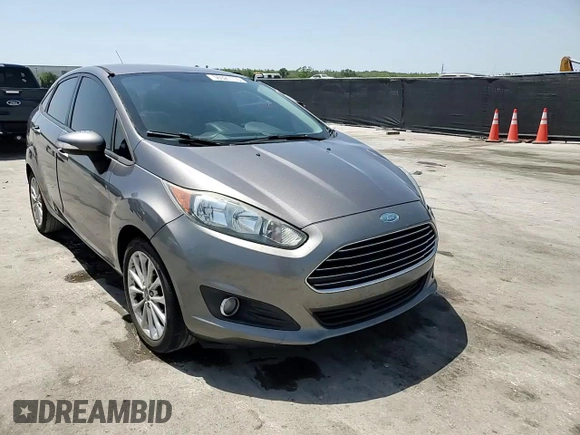 2014 Ford Fiesta SE z VIN 3FADP4BJ4EM110277, wystawiony jako Copart lot #56921115 z przebiegiem 126 536 mil mil oraz Szkoda całkowita • Salvage title. Historia ofert i sprzedaży dostępna na DreamBid. Obrazek 13.