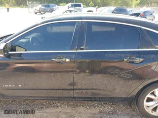 2016 Chevrolet Impala LT with VIN 2G1105SA1G9181772, listed as a IAAI auction lot 42005058 with 205,708 mi miles. Bid and sale history available at carsss.com. Image 14.