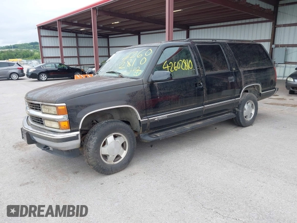 1999 Chevrolet Suburban with VIN 3GNFK16R4XG232727, listed as a IAAI auction lot 42602810 with 121,395 mi miles and . Bid and sale history available at DreamBid. Image 2.