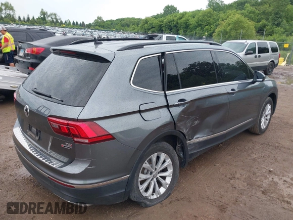 2018 Volkswagen Tiguan SEL with VIN 3VV2B7AX1JM166258, listed as a IAAI auction lot 42559513 with 36,246 mi miles and . Bid and sale history available at DreamBid. Image 4.