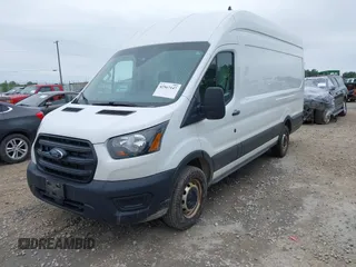 2020 Ford Transit Cargo with VIN 1FTBR3X83LKB51984, listed as a IAAI auction lot 42567147 with 209,178 mi miles and . Bid and sale history available at DreamBid. Image 2.
