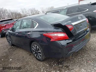 2018 Nissan Altima 2.5 SL with VIN 1N4AL3AP7JC165994, listed as a IAAI auction lot 41678939 with 126,336 mi miles. Bid and sale history available at carsss.com. Image 3.