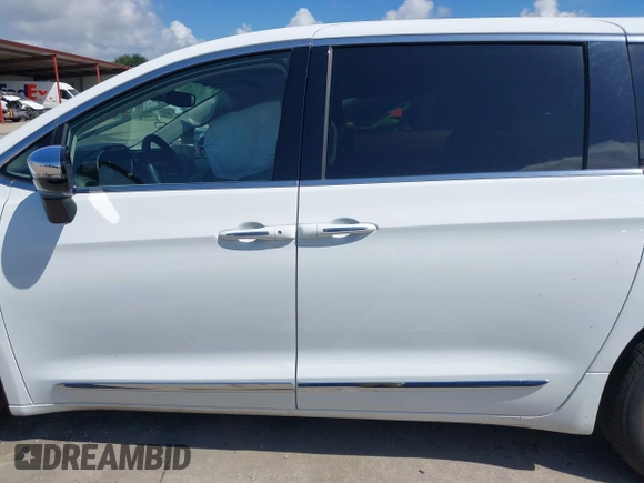 2023 Chrysler Pacifica Hybrid Limited with VIN 2C4RC1S75PR559106, listed as a IAAI auction lot 42613325 with 62,749 mi miles and . Bid and sale history available at DreamBid. Image 13.