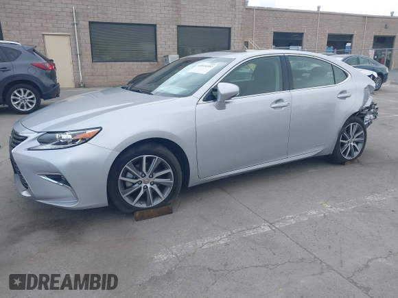 2016 Lexus ES 300h with VIN JTHBW1GG6G2118339, listed as a IAAI auction lot 41910352 with 73,184 mi miles and . Bid and sale history available at DreamBid. Image 2.