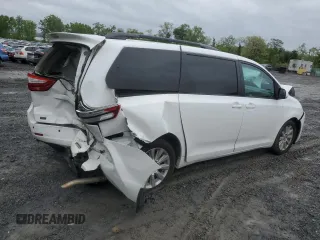 2015 Toyota Sienna LE with VIN 5TDJK3DCXFS126604, listed as a Copart auction lot 56987355 with 102,079 mi miles and Salvage title. Bid and sale history available at DreamBid. Image 3.