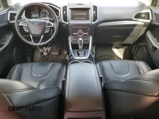2015 Ford Edge Titanium z VIN 2FMTK3K87FBB38309, wystawiony jako Copart lot #79662514 z przebiegiem 185 342 mil mil oraz Szkoda całkowita • Salvage title. Historia ofert i sprzedaży dostępna na DreamBid. Obrazek 8.