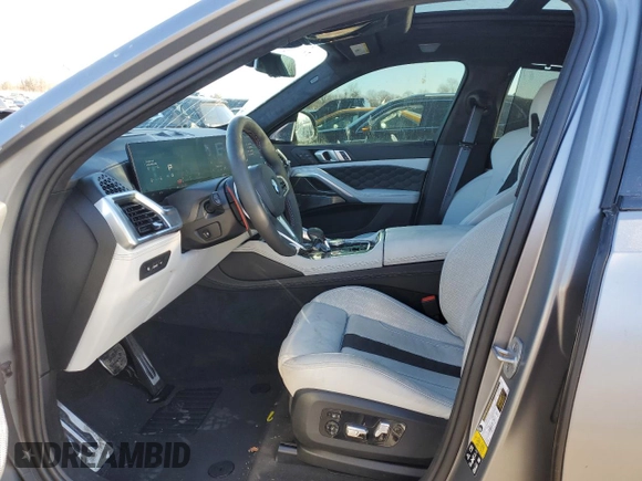 2024 BMW X6 M with VIN 5YM23ET0XR9U26576, listed as a Copart auction lot 86698164 with 6,669 mi miles and Salvage Title. Bid and sale history available at carsss.com. Image 7.