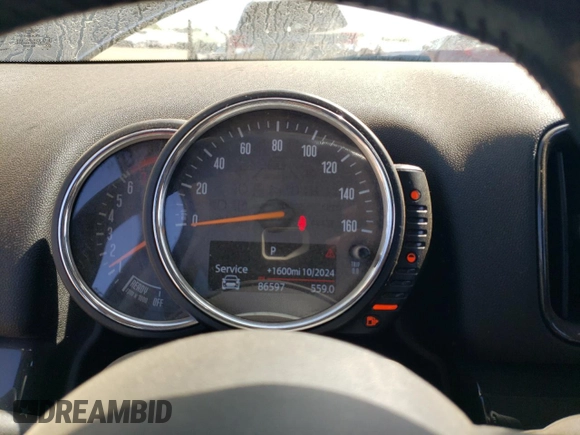 2017 MINI Countryman Cooper with VIN WMZYV5C38H3E01204, listed as a Copart auction lot 70489714 with 86,597 mi miles and Salvage Title. Bid and sale history available at carsss.com. Image 9.