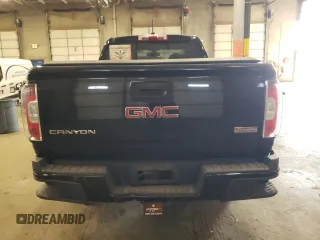 2015 GMC Canyon 4WD SLE with VIN 1GTH6BE32F1168788, listed as a Copart auction lot 76972934 with 158,562 mi miles and Salvage Title. Bid and sale history available at carsss.com. Image 6.