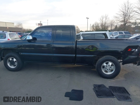2002 Chevrolet Silverado 1500 LT with VIN 1GCEK19T42E150069, listed as a IAAI auction lot 41401949 with 105,099 mi miles. Bid and sale history available at carsss.com. Image 14.