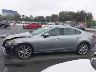 2014 Mazda 6 i Touring with VIN JM1GJ1V60E1141831, listed as a IAAI auction lot 42131200 with 86,597 mi miles and . Bid and sale history available at DreamBid. Image 14.