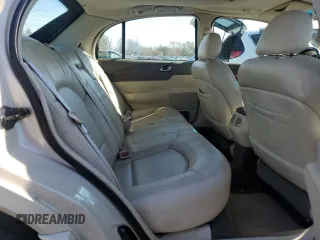 1999 Lincoln Continental with VIN 1LNHM97V1XY610090, listed as a Copart auction lot 50447685 with 105,375 mi miles and Clean Title. Bid and sale history available at DreamBid. Image 10.