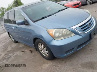 2009 Honda Odyssey EX-L with VIN 5FNRL38709B016019, listed as a IAAI auction lot 42087099 with 227,141 mi miles. Bid and sale history available at carsss.com. Image 1.