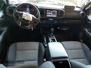 2021 Toyota Tacoma SR with VIN 3TMCZ5AN6MM393306, listed as a Copart auction lot 41483325 with 57,217 mi miles and Salvage title. Bid and sale history available at DreamBid. Image 8.
