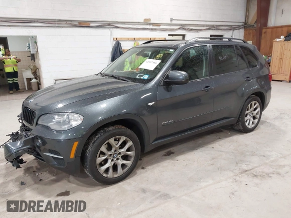 2012 BMW X5 35i z VIN 5UXZV4C59CL985715, wystawiony jako IAAI lot #42307586 z przebiegiem 105 147 mil mil oraz . Historia ofert i sprzedaży dostępna na DreamBid. Obrazek 17.