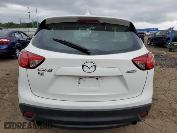 2014 Mazda CX-5 Sport with VIN JM3KE2BE8E0374434, listed as a Copart auction lot 61615445 with 111,330 mi miles and Clean title. Bid and sale history available at DreamBid. Image 6.