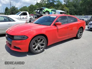 2015 Dodge Charger SXT with VIN 2C3CDXHG3FH722051, listed as a Copart auction lot 61840395 with 122,468 mi miles and Salvage title. Bid and sale history available at DreamBid. Image 1.
