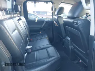 2010 Nissan Titan with VIN 1N6BA0FC1AN320629, listed as a IAAI auction lot 42491569 with 169,819 mi miles and . Bid and sale history available at DreamBid. Image 8.