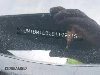 2014 Mazda 3 S Touring with VIN JM1BM1L32E1199515, listed as a IAAI auction lot 41783271 with 152,443 mi miles and . Bid and sale history available at DreamBid. Image 17.