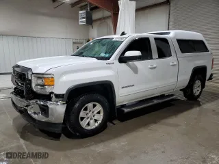 2015 GMC Sierra 1500 SLE with VIN 1GTV2UEH3FZ203779, listed as a Copart auction lot 52210995 with 86,789 mi miles and Salvage Title. Bid and sale history available at carsss.com. Image 1.