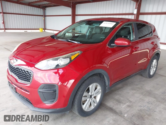 2018 Kia Sportage LX with VIN KNDPM3AC5J7328469, listed as a IAAI auction lot 42134262 with 126,482 mi miles and . Bid and sale history available at carsss.com. Image 2.