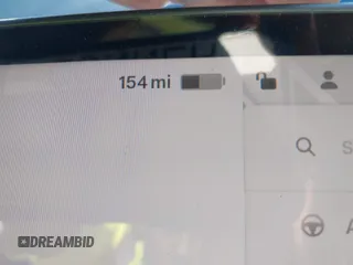 2023 Tesla Model 3 Long Range z VIN 5YJ3E1EB7PF704061, wystawiony jako IAAI lot #42079045 z przebiegiem 4 012 mil mil oraz . Historia ofert i sprzedaży dostępna na DreamBid. Obrazek 17.