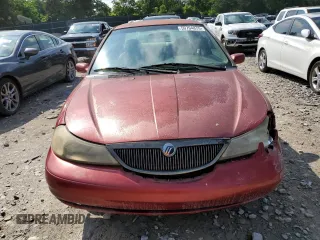 2000 Mercury Mystique GS z VIN 1MEFM6530YK615859, wystawiony jako Copart lot #59704875 z przebiegiem 259 272 mil mil oraz Szkoda całkowita • Salvage title. Historia ofert i sprzedaży dostępna na DreamBid. Obrazek 5.