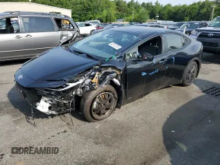 2024 Toyota Prius LE z VIN JTDADABU1R3016086, wystawiony jako Copart lot #60742725 z przebiegiem 9 152 mil mil oraz Czysty tytuł • Clean title. Historia ofert i sprzedaży dostępna na DreamBid. Obrazek 1.