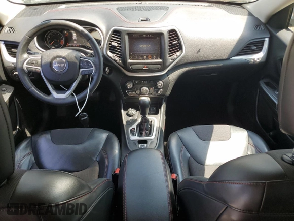 2015 Jeep Cherokee Trailhawk with VIN 1C4PJMBS6FW785891, listed as a Copart auction lot 61040565 with 156,421 mi miles and Clean title. Bid and sale history available at DreamBid. Image 8.