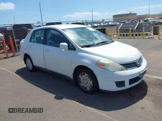 2009 Nissan Versa 1.8 S with VIN 3N1BC11E99L371998, listed as a IAAI auction lot 41723771 with 130,172 mi miles. Bid and sale history available at carsss.com. Image 1.