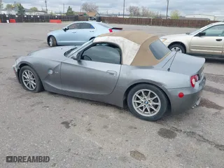 2005 BMW Z4 2.5i with VIN 4USBT33525LS55564, listed as a IAAI auction lot 42023146 with 97,349 mi miles. Bid and sale history available at carsss.com. Image 3.