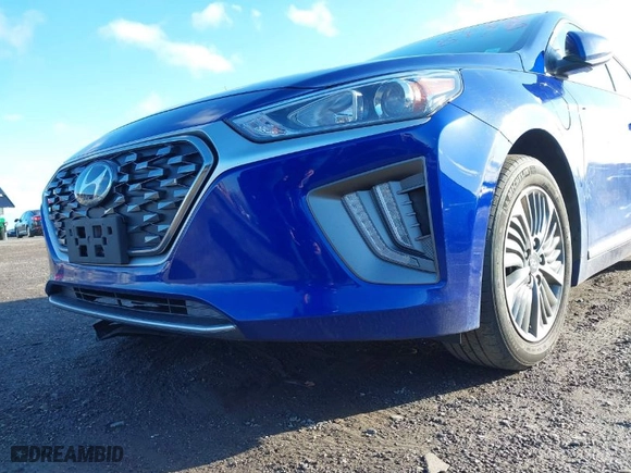 2022 Hyundai Ioniq Plug-In Hybrid SE with VIN KMHC65LD1NU278652, listed as a IAAI auction lot 41828778 with 57,711 mi miles. Bid and sale history available at carsss.com. Image 6.