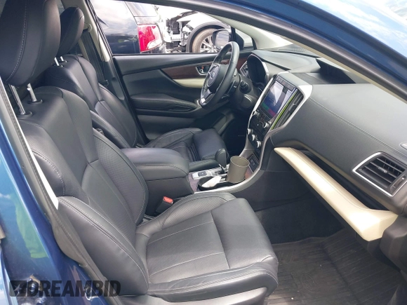 2022 Subaru Ascent Touring with VIN 4S4WMARD9N3400473, listed as a IAAI auction lot 42633365 with 42,019 mi miles and . Bid and sale history available at DreamBid. Image 5.