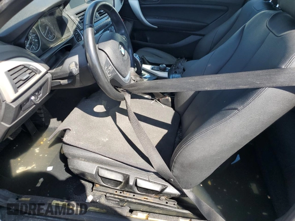 2015 BMW 2 Series 228i with VIN WBA1K5C52FV474012, listed as a Copart auction lot 73830094 with Not provided miles and Non repairable. Bid and sale history available at DreamBid. Image 7.