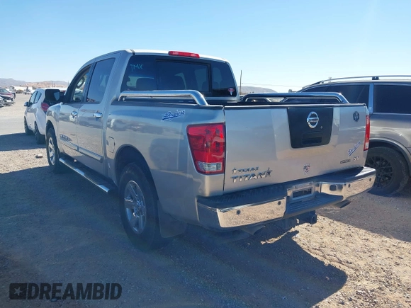 2011 Nissan Titan SV with VIN 1N6BA0ED7BN318878, listed as a IAAI auction lot 41518618 with 169,890 mi miles and . Bid and sale history available at DreamBid. Image 3.