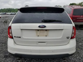 2013 Ford Edge SEL z VIN 2FMDK4JC6DBC06435, wystawiony jako Copart lot #54559065 z przebiegiem 163 407 mil mil oraz Szkoda całkowita • Salvage title. Historia ofert i sprzedaży dostępna na DreamBid. Obrazek 6.