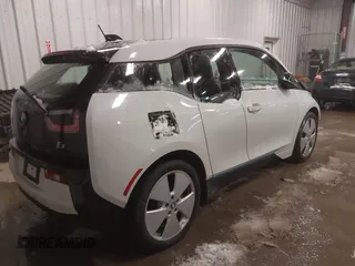 2015 BMW i3 z VIN WBY1Z4C53FV504836, wystawiony jako IAAI lot #41155614 z przebiegiem 66 910 mil mil oraz . Historia ofert i sprzedaży dostępna na DreamBid. Obrazek 4.