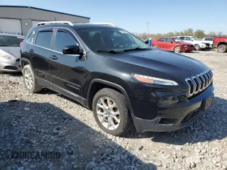 2016 Jeep Cherokee 75th Anniversary with VIN 1C4PJLCB2GW125664, listed as a Copart auction lot 51656985 with 111,479 mi miles and Salvage Title. Bid and sale history available at carsss.com. Image 4.