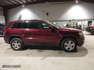 2018 Jeep Grand Cherokee Laredo E with VIN 1C4RJFAG9JC359284, listed as a IAAI auction lot 41032232 with 163,679 mi miles. Bid and sale history available at carsss.com. Image 13.