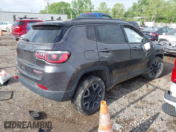 2019 Jeep Compass Trailhawk z VIN 3C4NJDDB5KT722107, wystawiony jako IAAI lot #42209114 z przebiegiem 65 088 mil mil oraz . Historia ofert i sprzedaży dostępna na DreamBid. Obrazek 4.