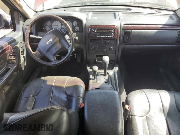 2002 Jeep Grand Cherokee Limited with VIN 1J4GW58N82C182603, listed as a Copart auction lot 57464295 with 240,179 mi miles and Salvage title. Bid and sale history available at DreamBid. Image 8.