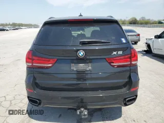 2016 BMW X5 xDrive50i z VIN 5UXKR6C50G0J81828, wystawiony jako Copart lot #52572315 z przebiegiem 91 737 mil mil oraz Szkoda całkowita • Salvage title. Historia ofert i sprzedaży dostępna na DreamBid. Obrazek 6.