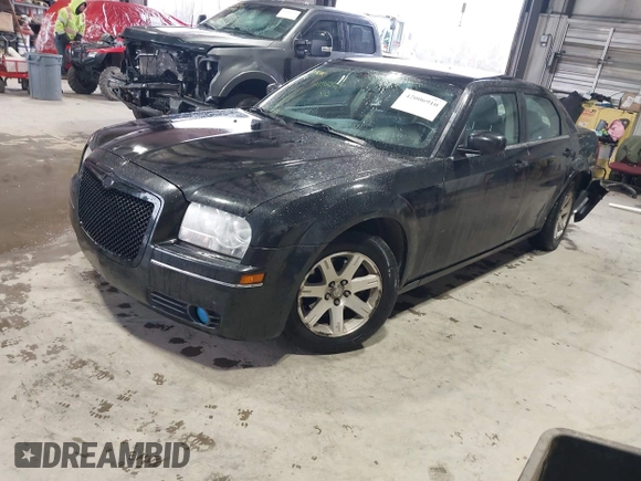 2007 Chrysler 300 Touring with VIN 2C3LA53G17H627980, listed as a IAAI auction lot 42006910 with 155,263 mi miles. Bid and sale history available at carsss.com. Image 2.