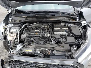 2022 Toyota Corolla Cross XLE with VIN 7MUDAABG2NV009663, listed as a Copart auction lot 55945735 with 59,473 mi miles and Salvage title. Bid and sale history available at DreamBid. Image 12.