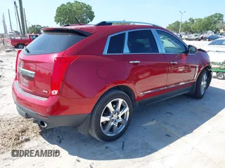 2012 Cadillac SRX Performance Collection with VIN 3GYFNBE36CS544861, listed as a IAAI auction lot 42330288 with 172,335 mi miles and . Bid and sale history available at DreamBid. Image 4.