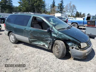 2001 Toyota Sienna LE with VIN 4T3ZF13C81U380901, listed as a Copart auction lot 54053615 with 194,910 mi miles and Salvage Title. Bid and sale history available at DreamBid. Image 4.